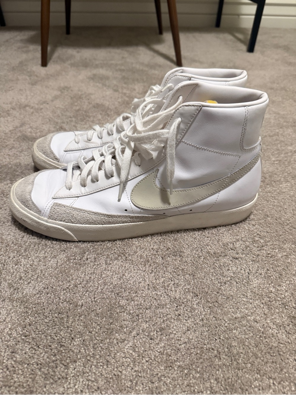 Nike White High-Top Sneakers with Cream Swoosh